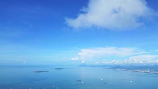 海南三亚三亚湾蓝色海洋天空空镜头航拍风景