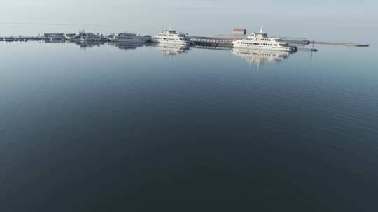 青海青海湖景区游轮码头航拍4K视频灰片