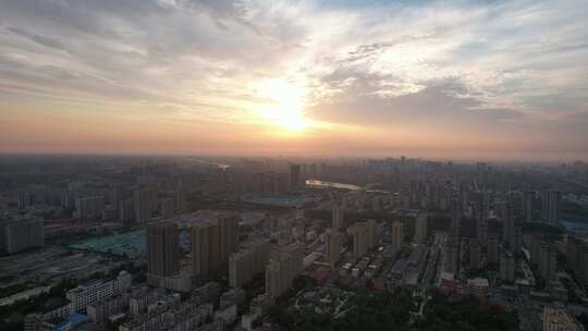 城市夕阳晚霞火烧云夜景降临航拍