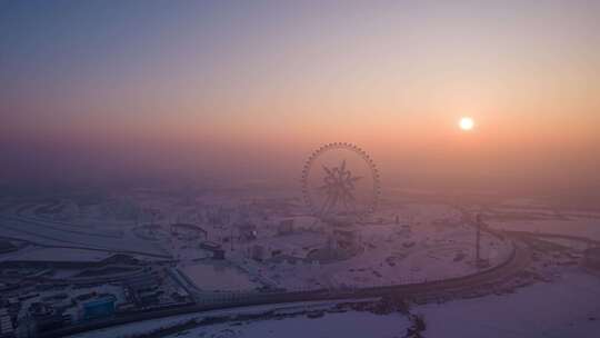 冬季热门哈尔滨冰雪大世界日出哈尔滨摩天轮