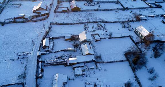 航拍大兴安岭严寒雪村人家