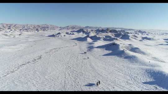 甘肃肃北牧民雪地骑马航拍空镜高清素材