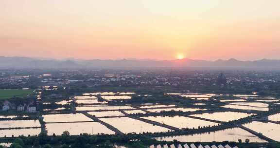 夕阳下的江南水乡水厂养殖鱼塘
