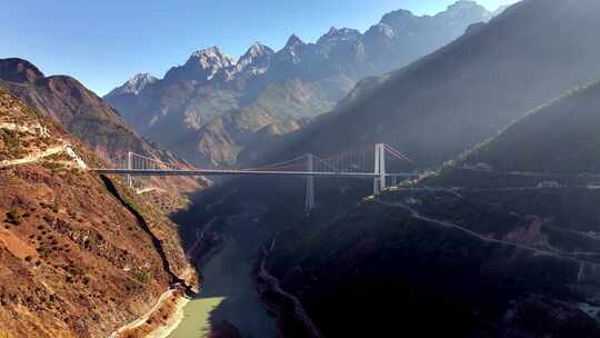 航拍云南虎跳峡和金沙江大桥日出风光视频素材模板下载