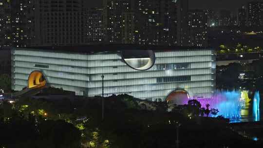 上海嘉定新城上海保利大剧院夜晚水景光影秀视频素材模板下载