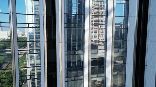 智慧科技风4K城市建筑玻璃幕墙无人机航拍