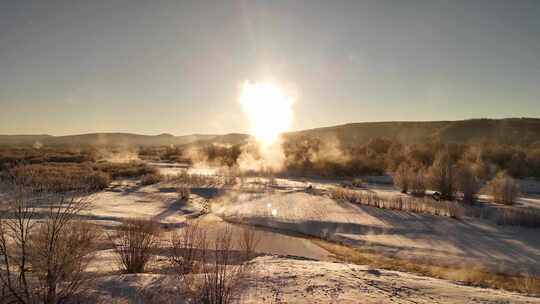 航拍河谷树林雪柳迷雾日出241118