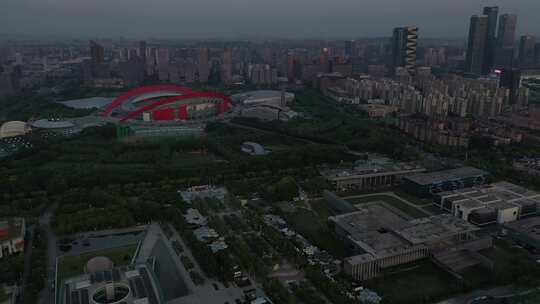傍晚航拍南京奥体中心和附近高楼
