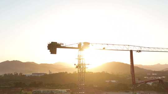 建筑工地航拍乡村建设农村开发吊塔日出工地