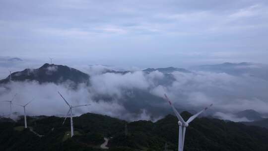 航拍罗定风车山云海大山风力发电新能源
