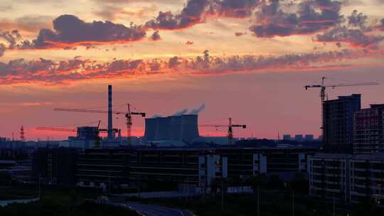 航拍夕阳火烧云火力发电站延时空镜能源