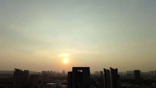 城市早晨太阳升起延时摄影视频素材模板下载