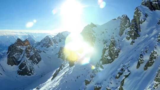 4k航拍光斑雪山 _逆光蓝天雪山