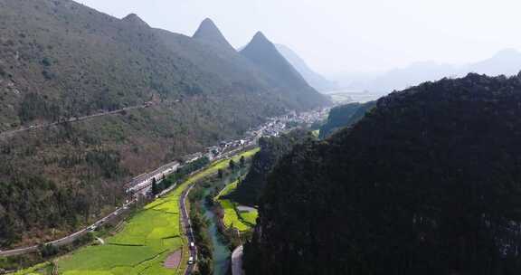 航拍贵州万峰林油菜花风光