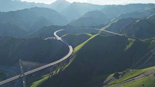航拍新疆山谷中的公路高架桥