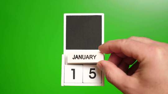 01.绿色背景上日期为1月15日的日历。