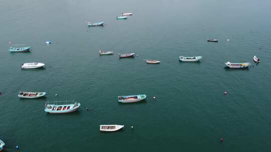 航拍沿海城市海上渔船