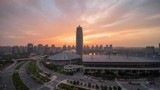 河南郑州CBD日转夜火烧云城市亮灯延时