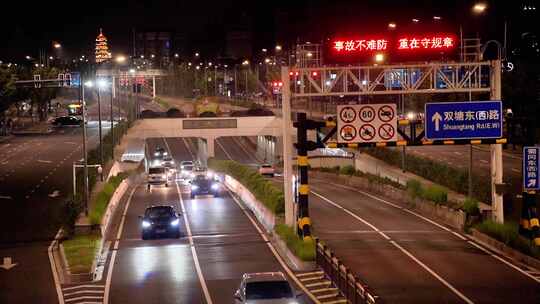 夜晚快速路隧道口车流马路行车亮化