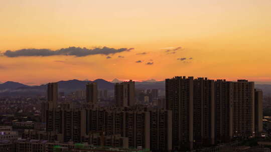 城市日落夕阳火烧云延时县城城区航拍延时