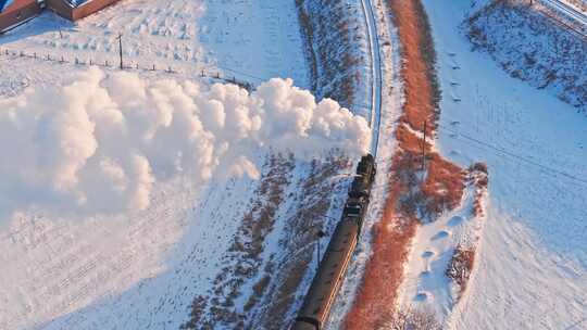 航拍中国东北冬季雪景中的蒸汽机车老火车