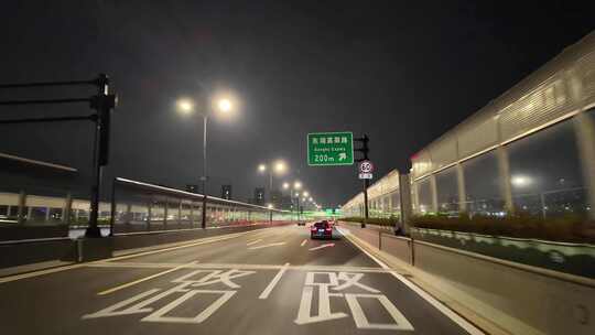 城市夜晚夜景开车第一视角汽车窗外沿途风景