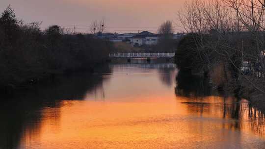 航拍乡村振兴龙型丁达尔光效河流夕阳