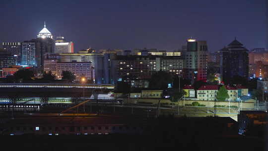 北京夜晚城市铁路交通列车行驶