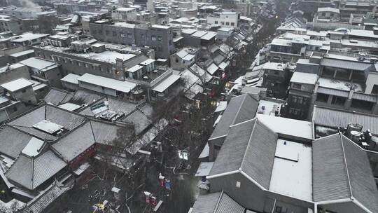 航拍陕西省西安市大雪中的西安风景