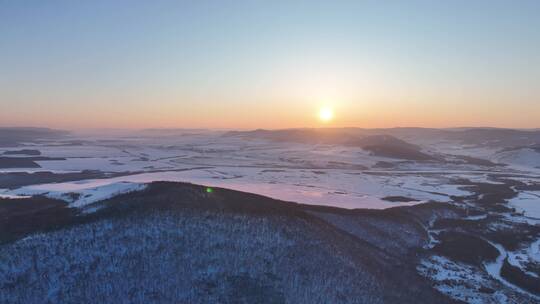 航拍内蒙古额尔古纳雪域山峦暮色