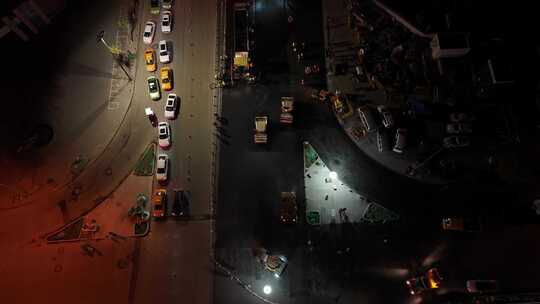 城市夜晚道路抢修过年路面翻修夜晚加班航拍