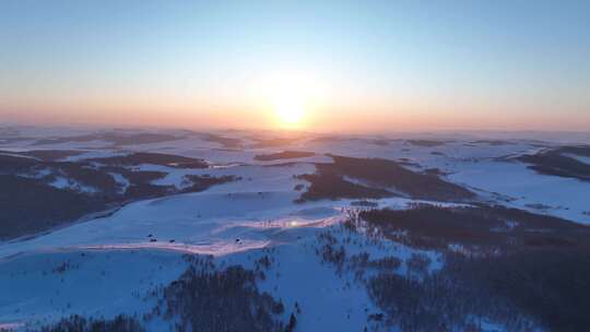 航拍内蒙古雪域雪原夕阳