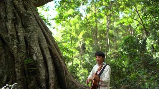原始雨林森林自然风光少数民族吉他唱歌