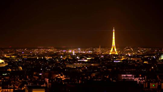 埃菲尔铁塔在夜间照亮视频素材模板下载