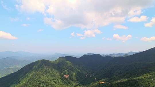 蓝天白云下的大山自然风景航拍