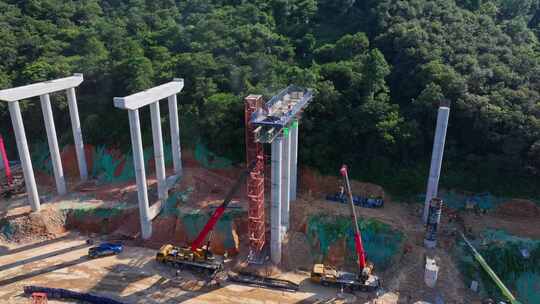 建设工地航拍大山里工程建筑高速桥梁施工