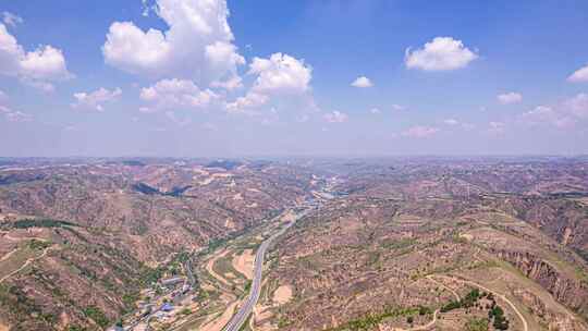 8K陕北黄土地貌高速基建穿过航拍延时