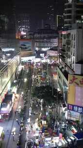 竖版航拍广西南宁城市夜市摊街景人流