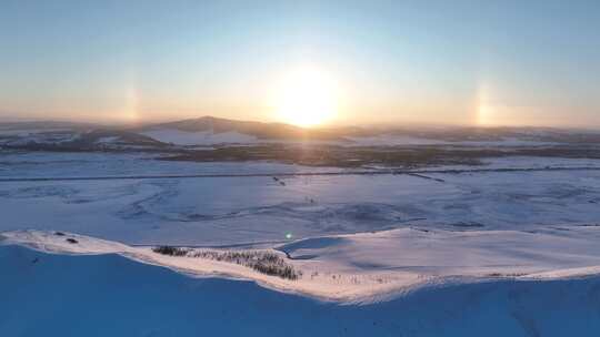 航拍雪域雪原灿烂夕阳