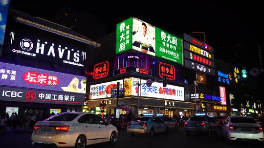 汽车窗外城市夜生活繁荣街道夜晚商业街中心视频素材模板下载