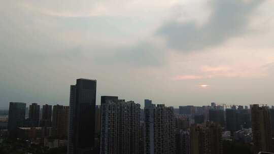 杭州钱塘新区高楼大厦日转夜延时摄影