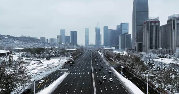 城市雪景航拍济南