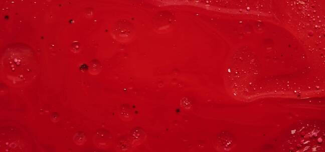 显微镜下流动的红色墨水