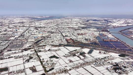 航拍乡镇雪景学校建筑田地大桥别墅河流房屋