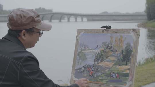 老者艺术家在河边公园写生画画慢动作升格视频素材模板下载