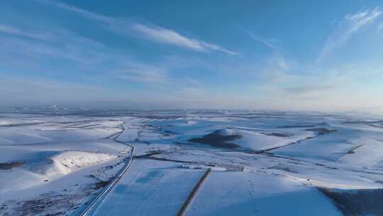 空中拍摄内蒙古寒冬丘陵雪原风光