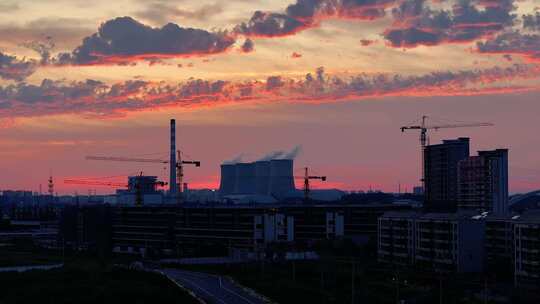 航拍火力发电厂夕阳火烧云楼层建筑施工地