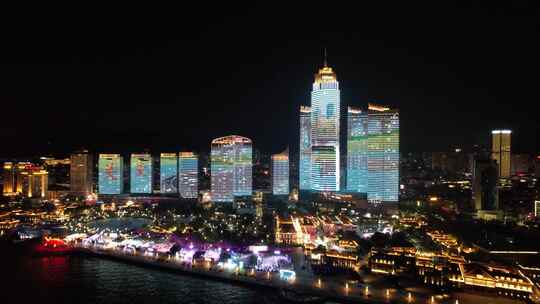 山东烟台滨海广场世贸大厦夜景灯光秀航拍视频素材模板下载