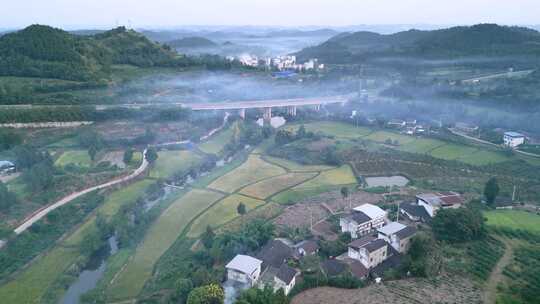 航拍四川南充炊烟袅袅的乡村风景