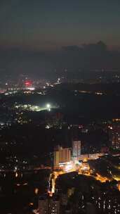 竖屏航拍四川乐山万家灯火城市夜景